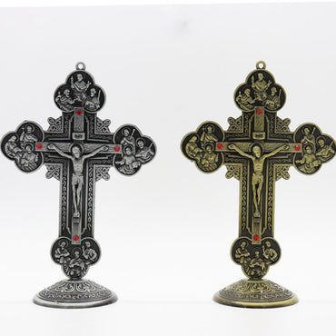 Crucifix seats on the table or hang on the wall